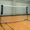 AC334_K01 - A white badminton racquet with black and red accents.