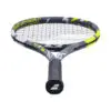 Close-up of a tennis player serving the ball with great focus and power