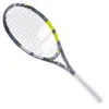 Tennis player in action, striking a powerful serve at an outdoor court