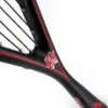 Tennis player serving a powerful shot with intense focus