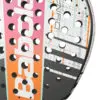 Tennis racquets lined up on a court, ready for play