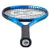 Professional tennis player showcasing a powerful smash shot with great form.