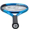 A tennis racket and tennis ball on a blue court