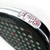 Tennis racket and ball on a clay court