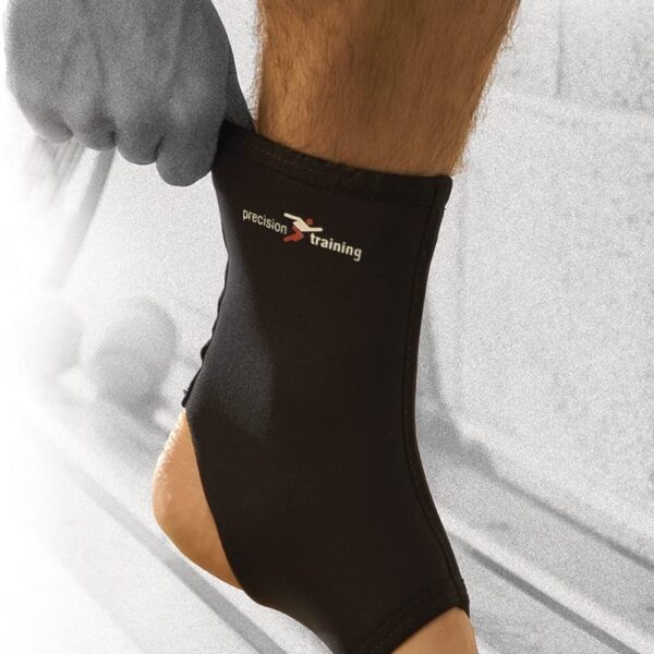 Black and white badminton racket with a grip and strings, suitable for professionals and enthusiasts.