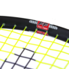 Tennis player swinging racquet in action