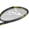 Tennis racket and ball on a green court