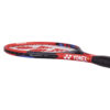 Tennis racquet with white and green strings and a comfortable grip